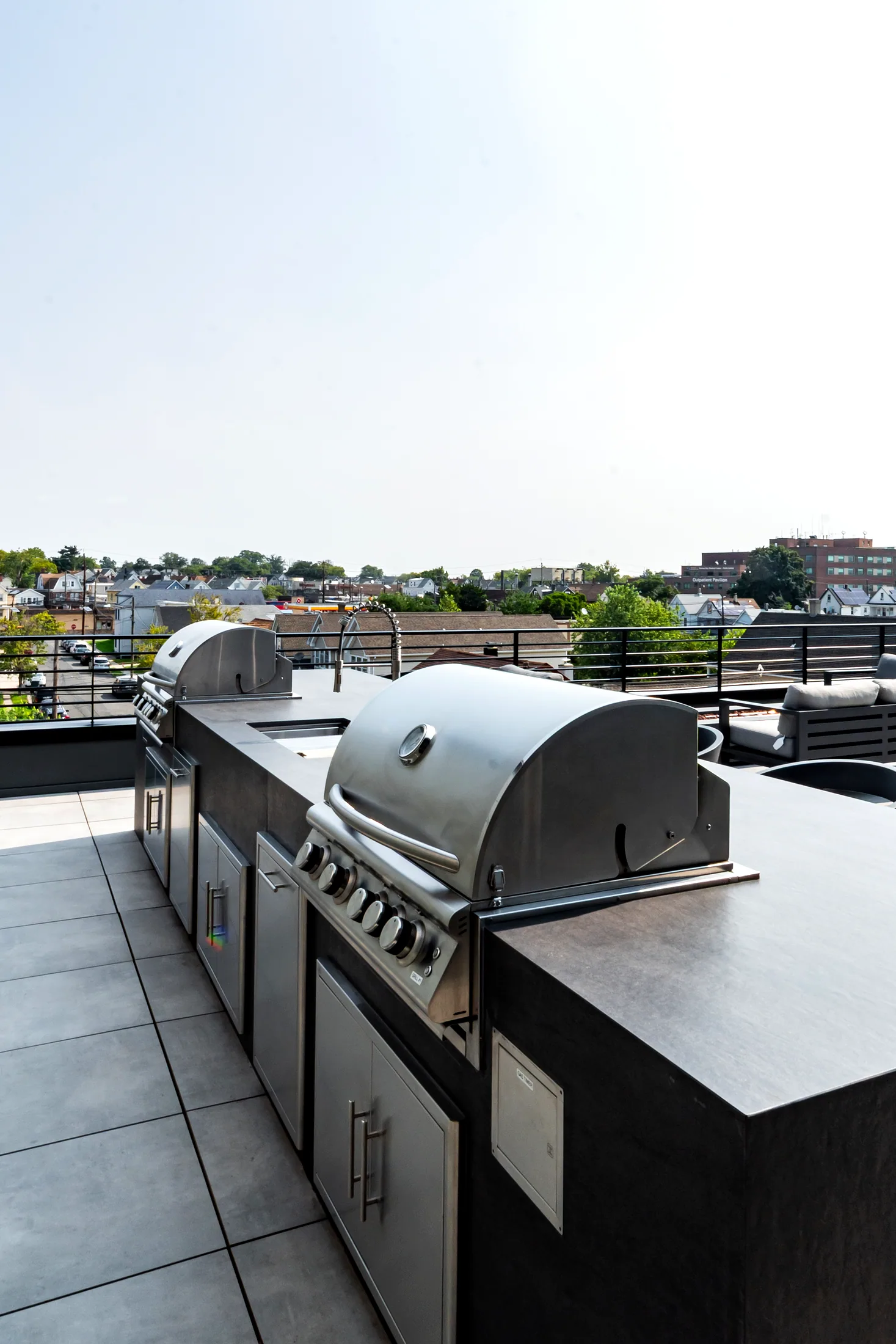 Grilling station on the roof terrace with the Perth Amboy skyline behind
